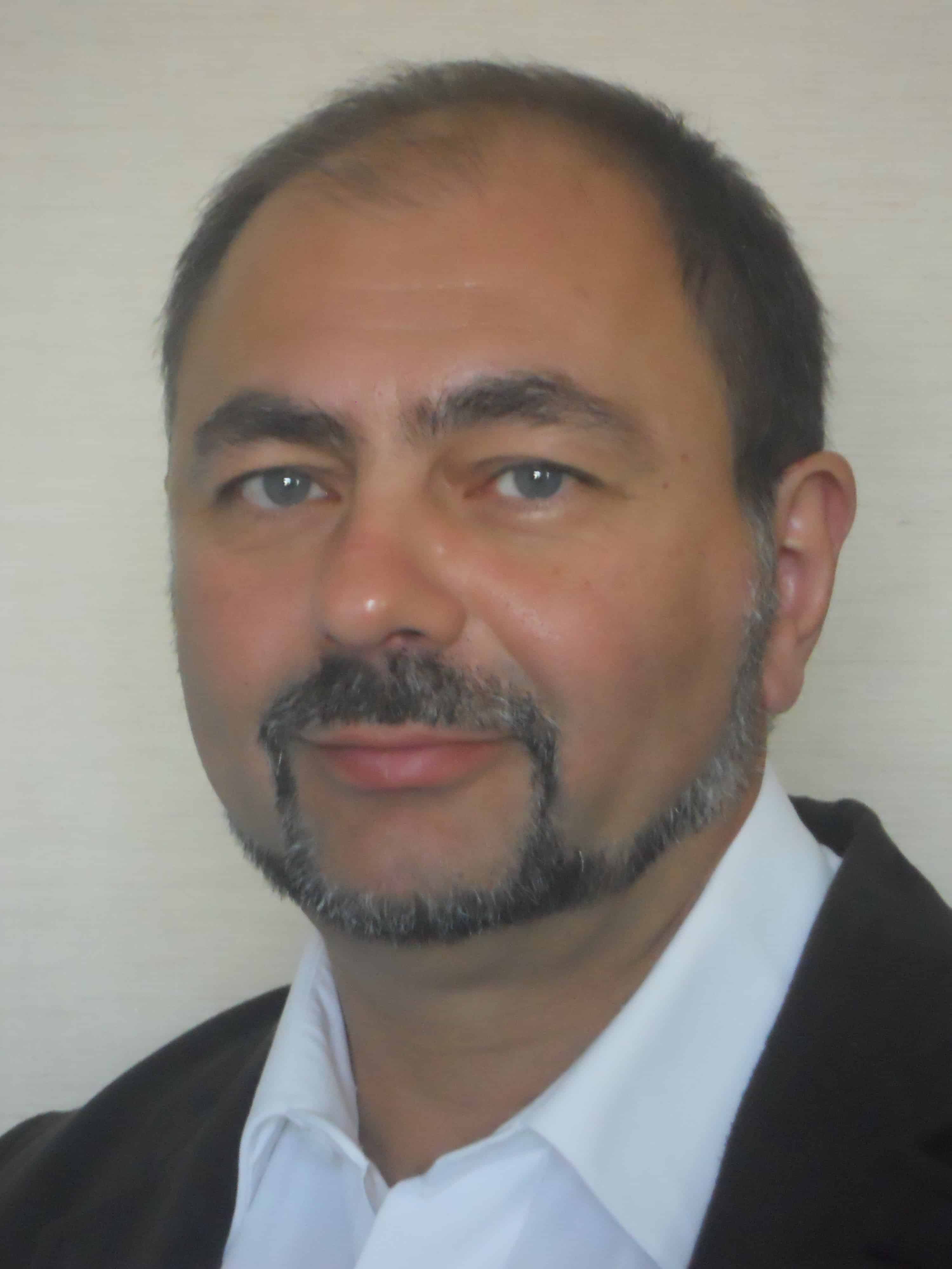 Porträtt av Merab Kokaia.